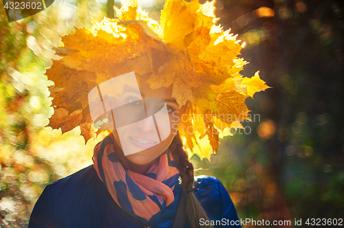 Image of Beauty woman at autumn park