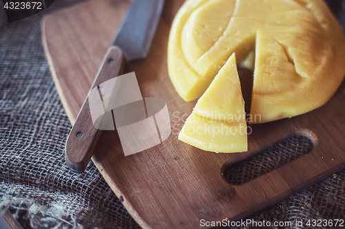 Image of aging cheese heads