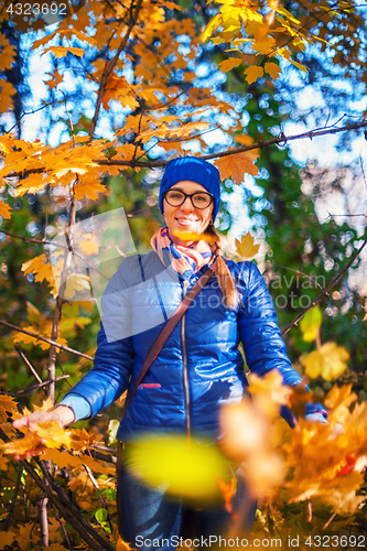 Image of Beauty woman at autumn park