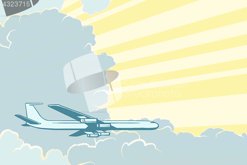 Image of Retro airplane flying in the clouds. Air travel background