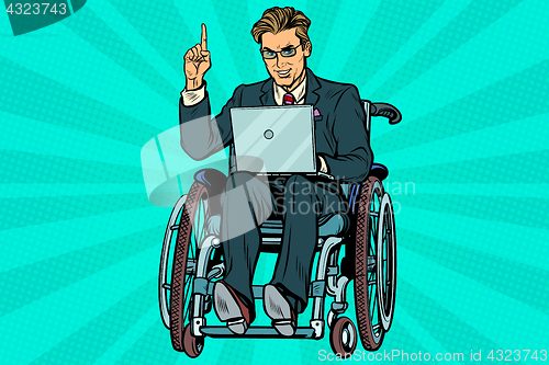 Image of businessman in wheelchair with laptop