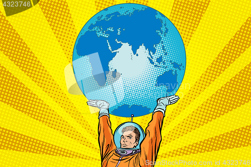 Image of Retro astronaut is holding the planet Earth