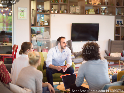 Image of Startup Business Team At A Meeting at modern office building