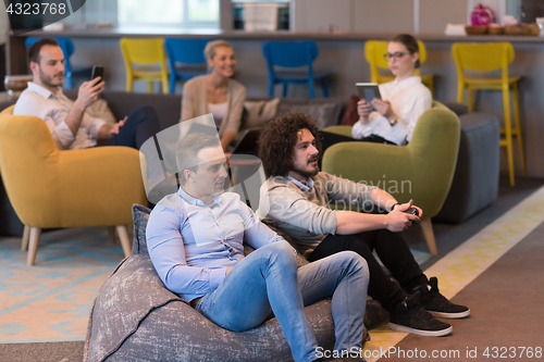 Image of startup Office Workers Playing computer games