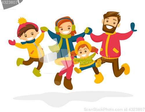 Image of Caucasian family jumping in the snow in winter.