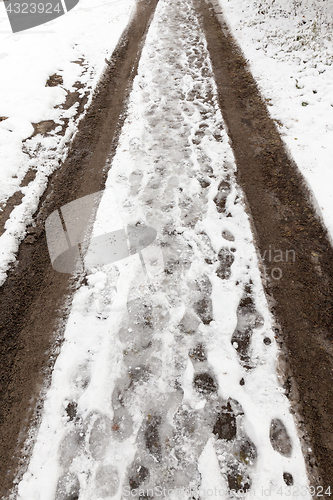 Image of traces of the car on snow