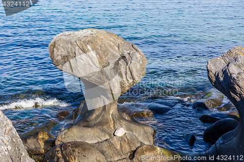 Image of Kannesteinen is a special shaped stone located on the shore of O