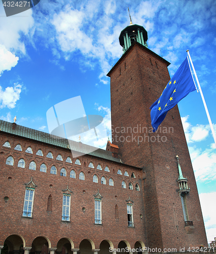 Image of Stockholm City Hall ( Stockholms stadshus) with EU flag in Stock