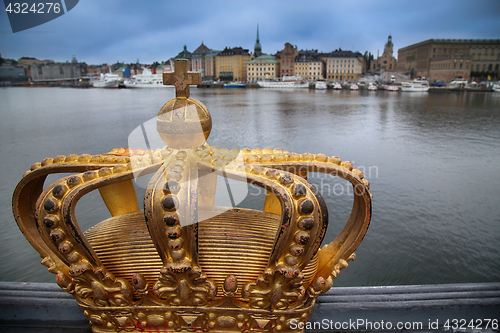 Image of Skeppsholmsbron (Skeppsholm Bridge) with Golden Crown on a bridg