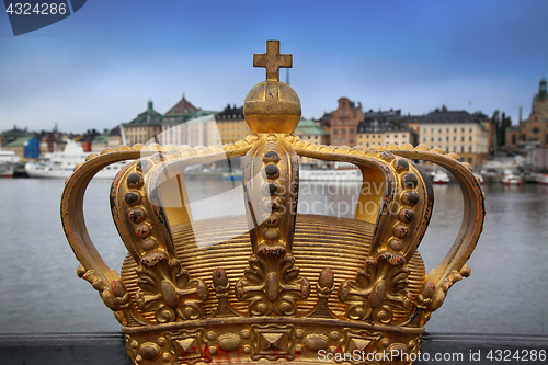 Image of Skeppsholmsbron (Skeppsholm Bridge) with Golden Crown on a bridg