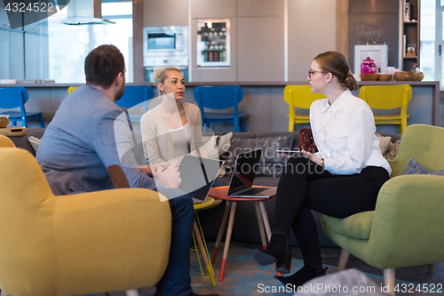Image of Startup Business Team At A Meeting at modern office building