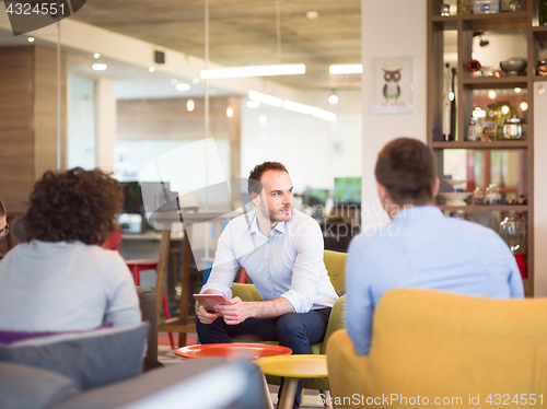 Image of Startup Business Team At A Meeting at modern office building