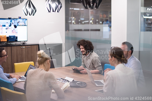 Image of Startup Business Team At A Meeting at modern office building
