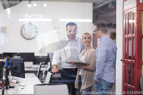 Image of Business team Working With laptop in creative office