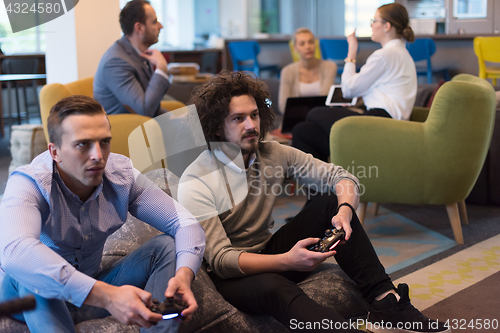 Image of startup Office Workers Playing computer games