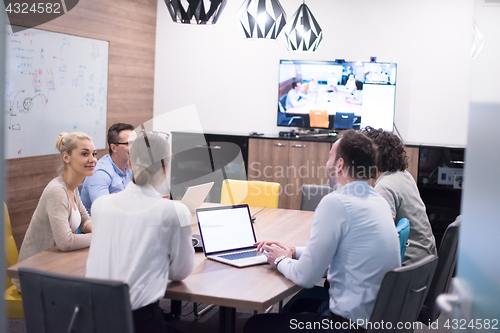 Image of Startup Business Team At A Meeting at modern office building