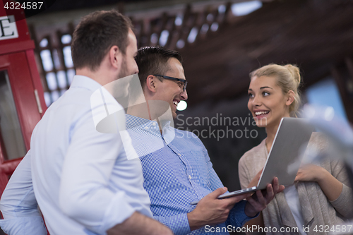 Image of Business team Working With laptop in creative office