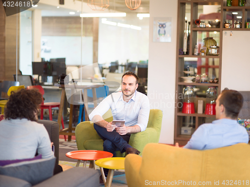 Image of Startup Business Team At A Meeting at modern office building