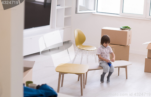 Image of boys in a new modern home