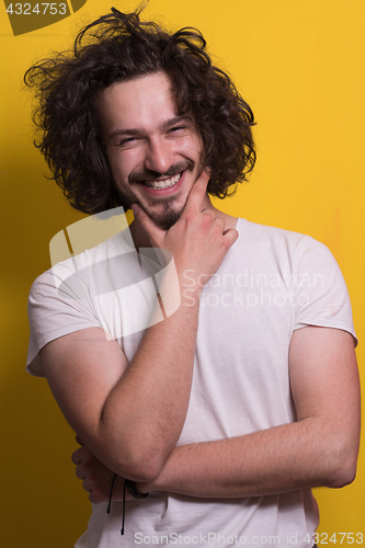 Image of young man with funny hair over color background