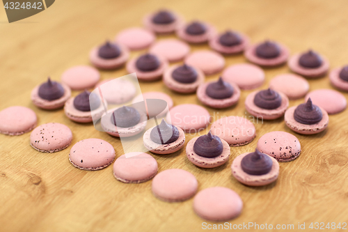 Image of macarons on table at confectionery or bakery