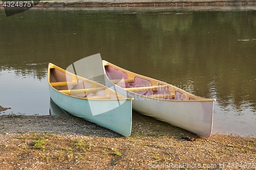 Image of Canoes on the Riverside