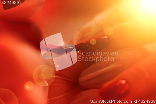 Image of Woman hands receiving a manicure