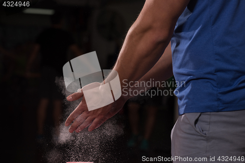 Image of Gym Chalk Magnesium Carbonate hands clapping man