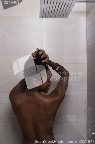 Image of African American woman in the shower