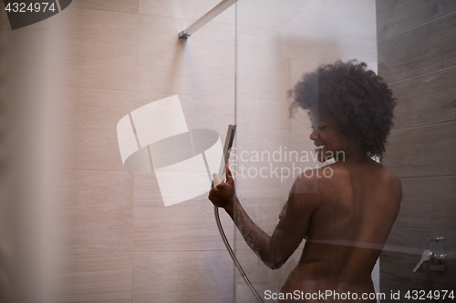 Image of African American woman in the shower