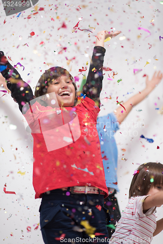 Image of kids  blowing confetti