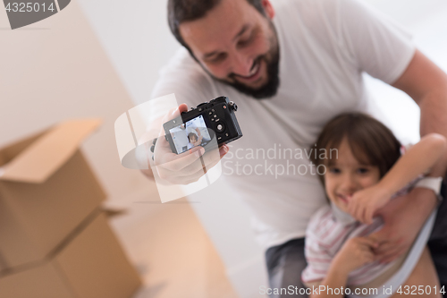 Image of selfie father and son