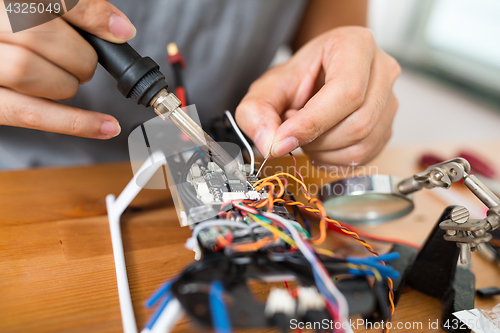 Image of Drone building at home