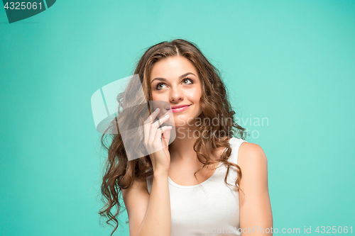 Image of The young woman\'s portrait with happy emotions