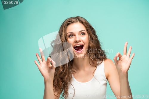 Image of The young woman\'s portrait with happy emotions