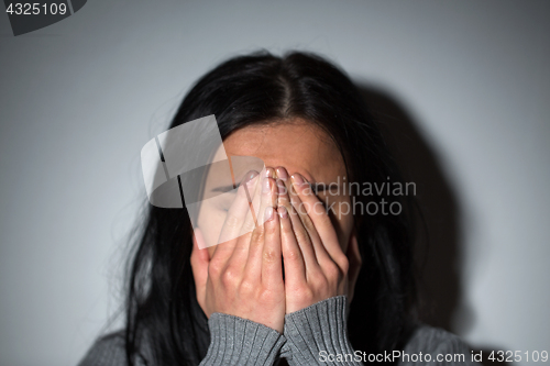 Image of sad crying woman suffering from domestic violence