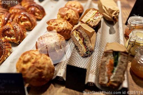 Image of bread and sandwiches with price at grocery store