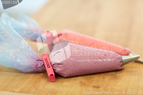 Image of confectionery bags with macaron batter or cream