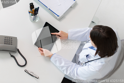 Image of doctor with tablet pc at clinic