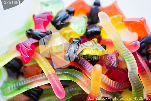 Image of gummy worms and bet candies for halloween party