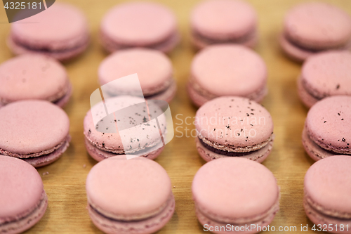 Image of macarons on table at confectionery or bakery