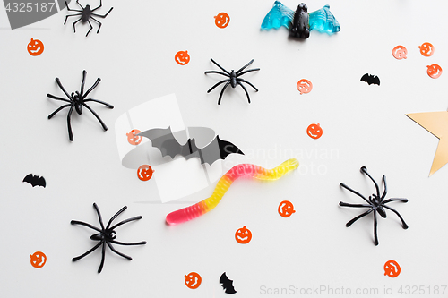 Image of halloween party paper decorations and sweets