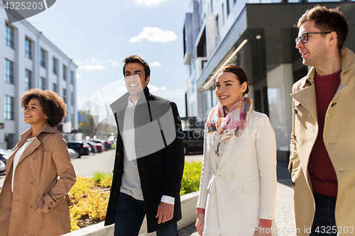 Image of international group of people on city street