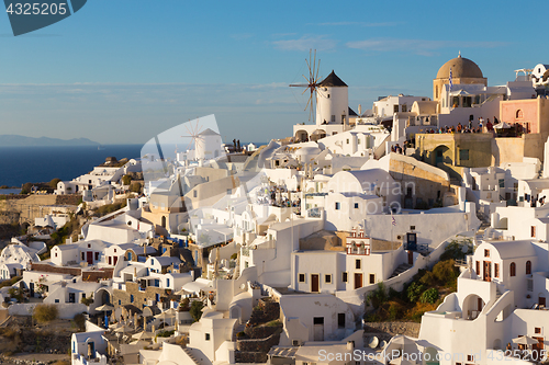 Image of Oia village at sunset, Santorini island, Greece.