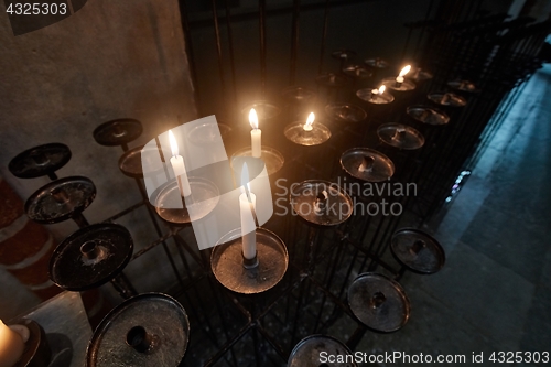 Image of Candles in a dark church