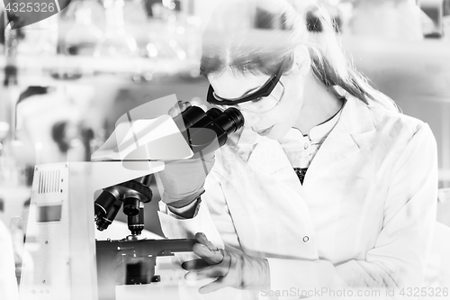 Image of Female health care researchers working in scientific laboratory.