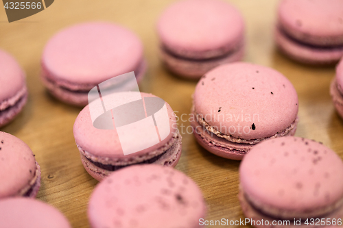 Image of macarons on table at confectionery or bakery