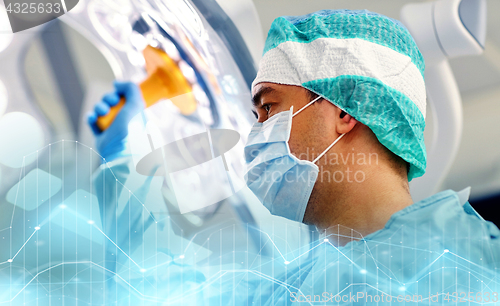 Image of surgeon in operating room at hospital