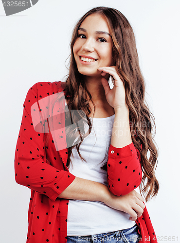 Image of young pretty teenage hipster girl posing emotional happy smiling on white background, lifestyle people concept 