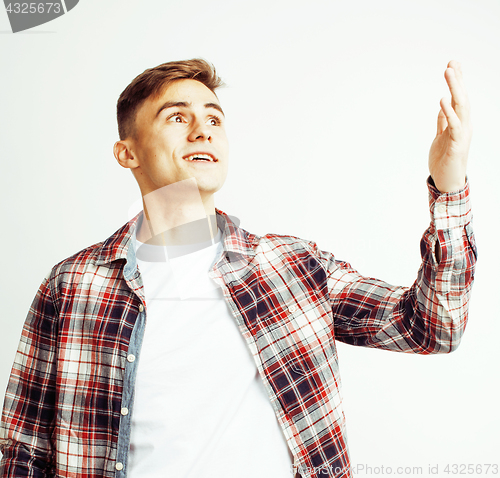 Image of young handsome teenage hipster guy posing emotional, happy smiling against white background isolated, lifestyle people concept 
